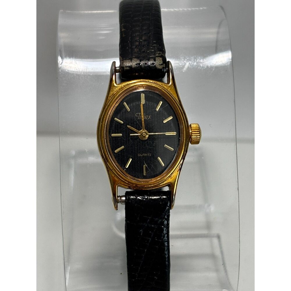 Vintage Timex quartz gold oval black dial women's watch, working